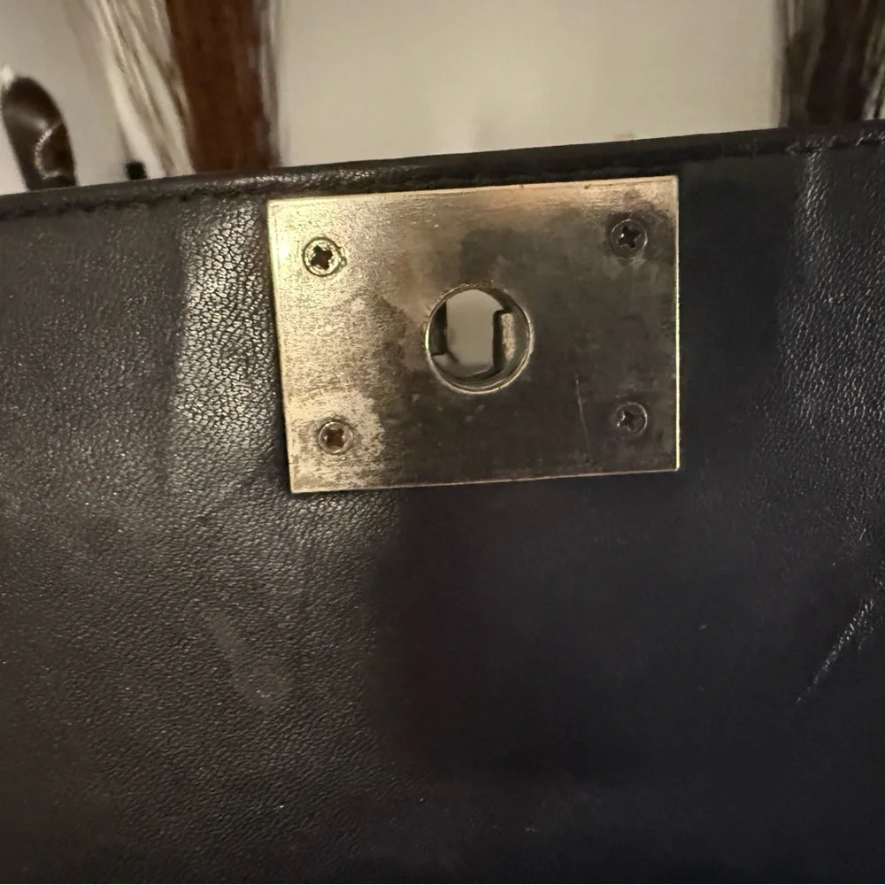 Chanel Black Crossbody Bag with Iconic Quilting - Picture 10 of 14